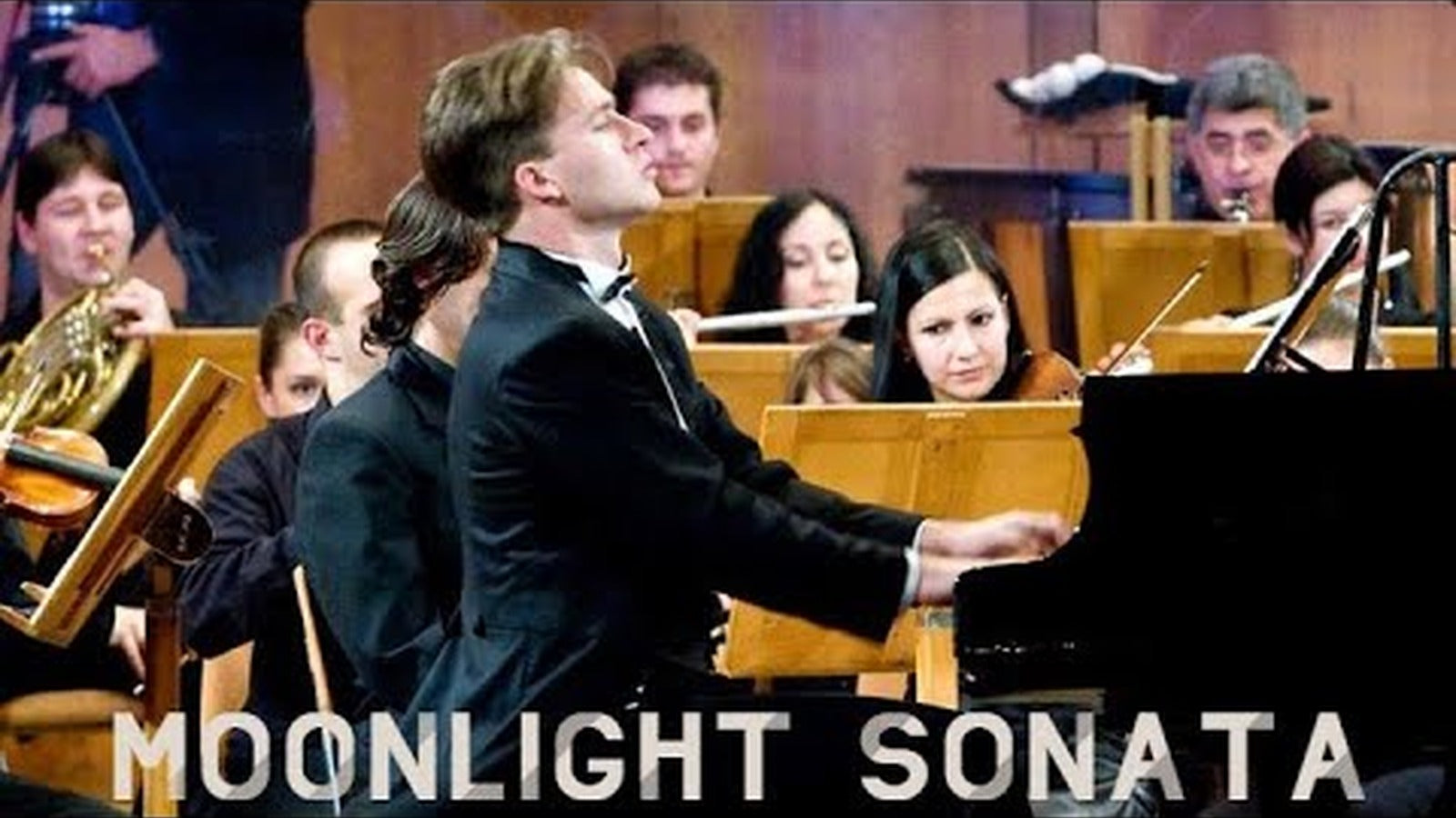 Georgii Cherkin performs Beethoven’s Moonlight Sonata, Movement I, with the Cantus Firmus Orchestra conducted by Grigor Palikarov.